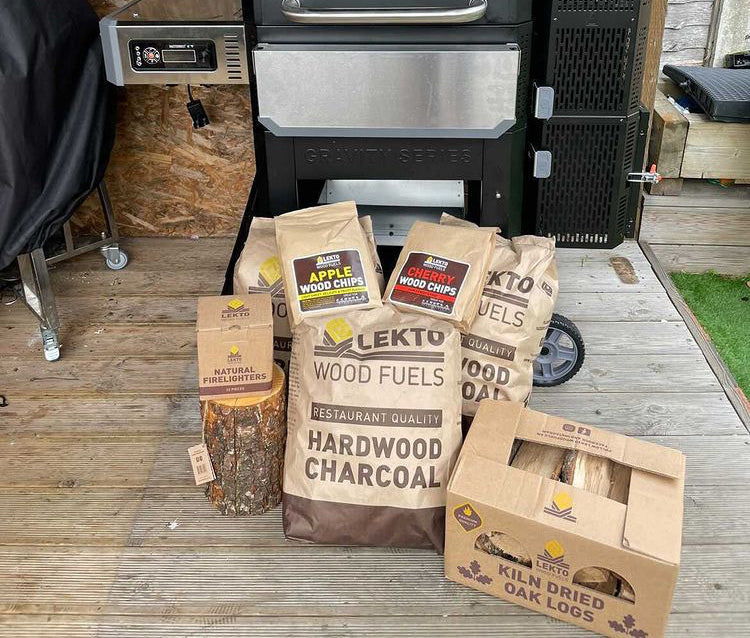 Lekto BBQ Fuels in front of Masterbuilt BBQ