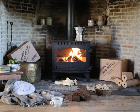 Wood Burning Stove in a rustic setting with a metal Coffee maker on top